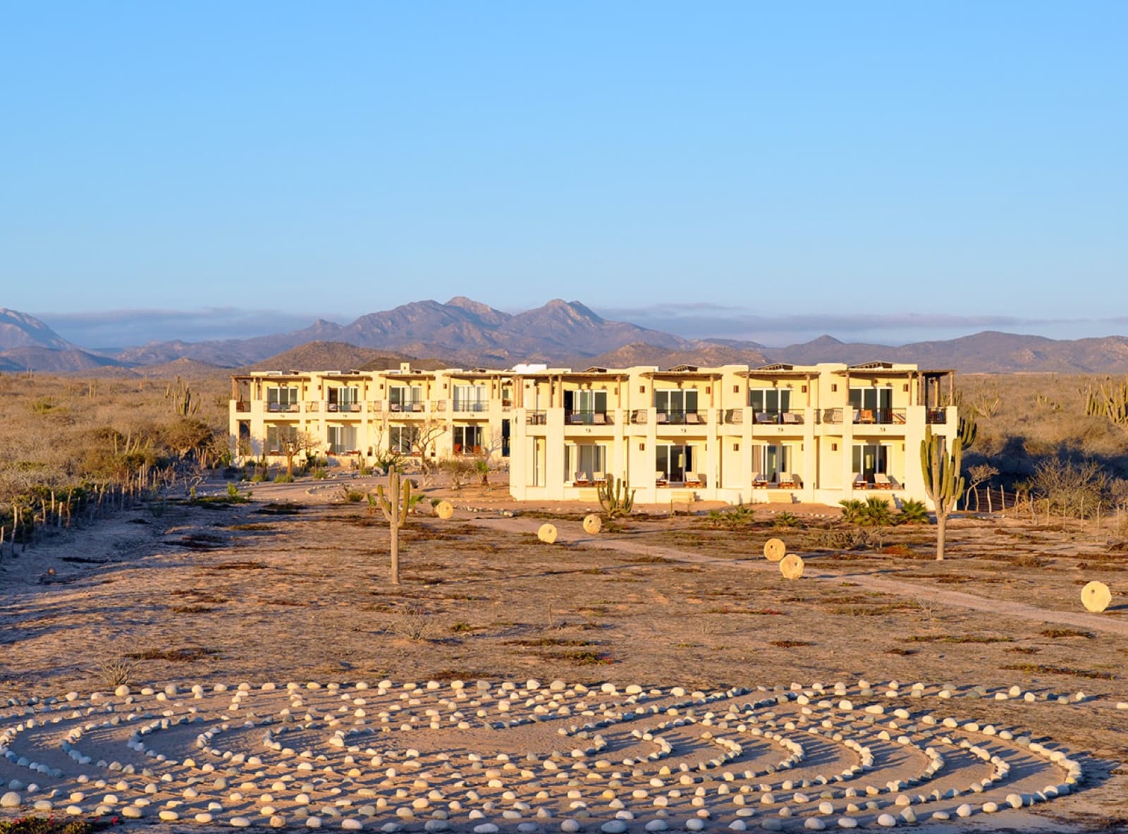 Guest rooms with labyrinth and mountain views
