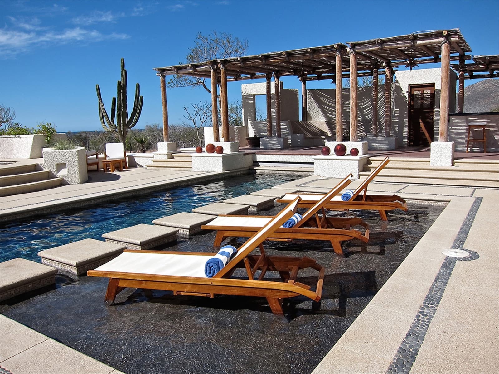 Chaise lounges by the pool