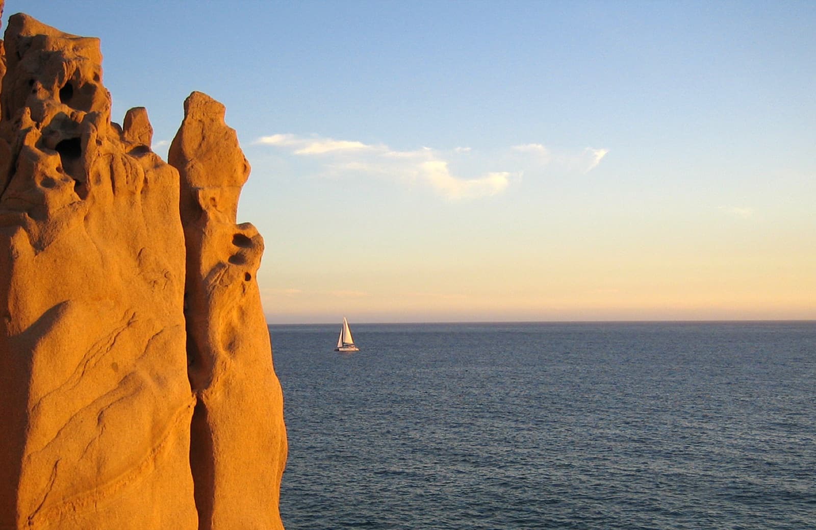 Sailboat passing Land's End